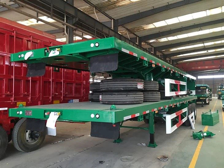 Remorque à plateau pour conteneur